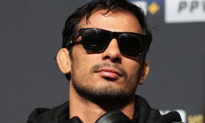 Alexandre Pantoja de óculos escuros durante a coletiva de imprensa do UFC 277.