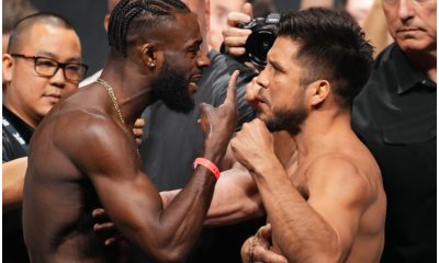 Aljamain Sterling coloca o dedo no rosto de Henry Cejudo durante acalorada encarada na pesagem cerimonial do UFC 288