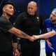 Robert Trujillo e Paul Teague se cumprimentam após o final da luta