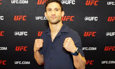 De punhos cerrados, Allan Puro Osso posa para foto durante o media day do UFC 107