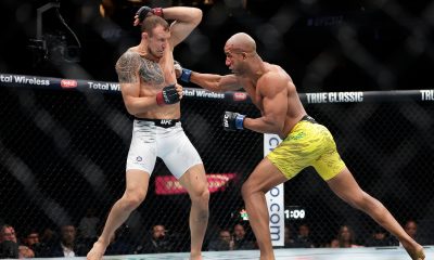 Jack Hermansson recebendo um direto no corpo de Gregory Rodrigues no UFC 317