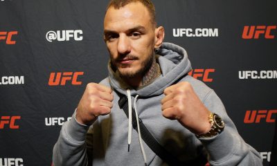 De moletom, Renato Moicano posa para foto no media day do UFC 317