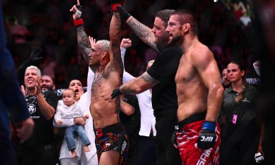 Charles do Bronx tendo o braço erguido após vitória sobre Mateusz Gamrot no UFC Rio