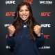 Sorridente, Mayra Sheetara posa foto no media day do UFC Vegas 111