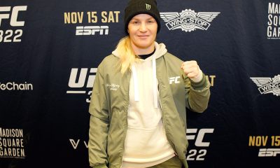 De gorro preto, Valentina Shevchenko posa para foto no media day do UFC 322