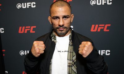 Alexandre Pantoja posa para foto no media day do UFC 323