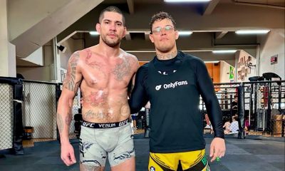 Alex Poatan e Caio Borralho posando para foto após treino na Fighting Nerds