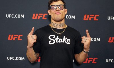 Com o óculos da Fighting Nerds, Caio Borralho posa após vitória no UFC 326