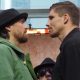 Oleksandr Usyk (à esquerda) e Rico Verhoeven ficaram mais de dois minutos se encarando