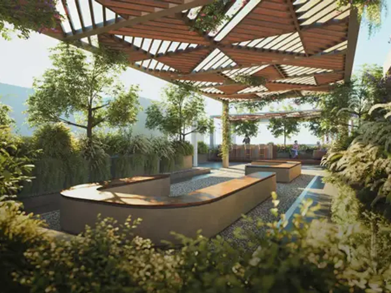 Landscaped community courtyard at Anvita Ivana with seating areas and gardens in Kollur