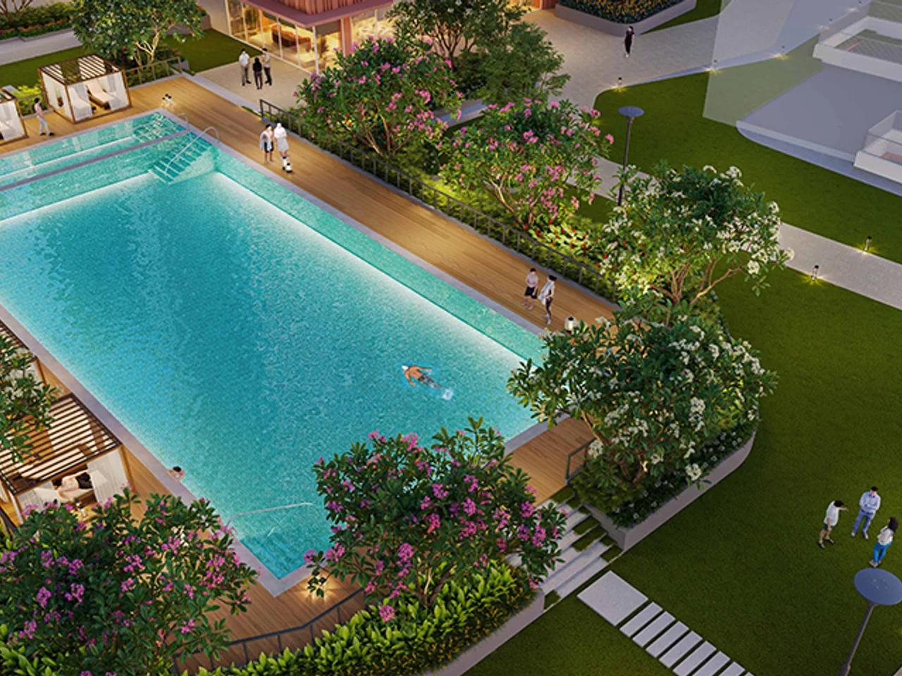 Half-Olympic pool with wooden deck, sun loungers and palm trees