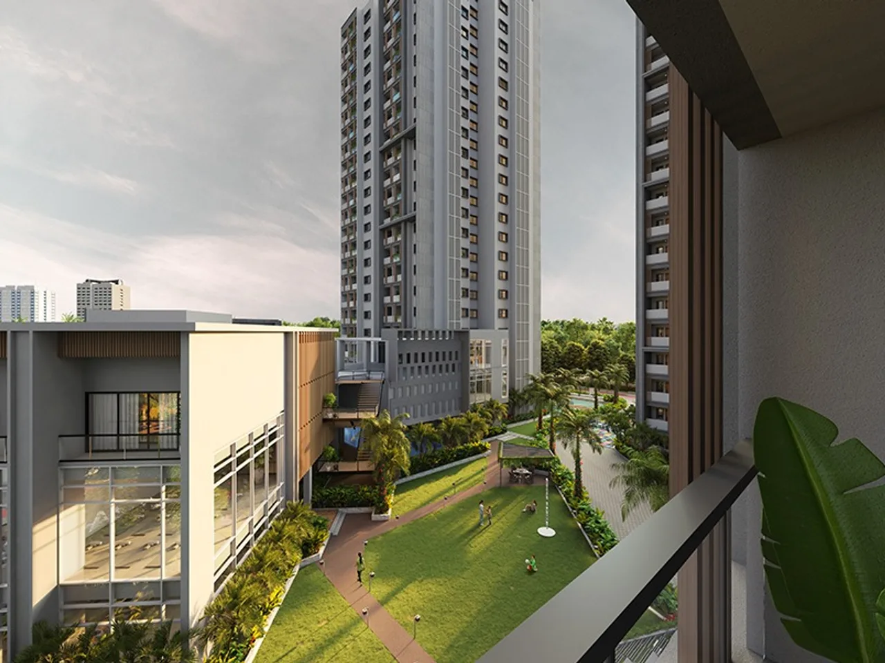 Spacious balcony view from a premium apartment overlooking landscaped gardens and neighbouring towers.