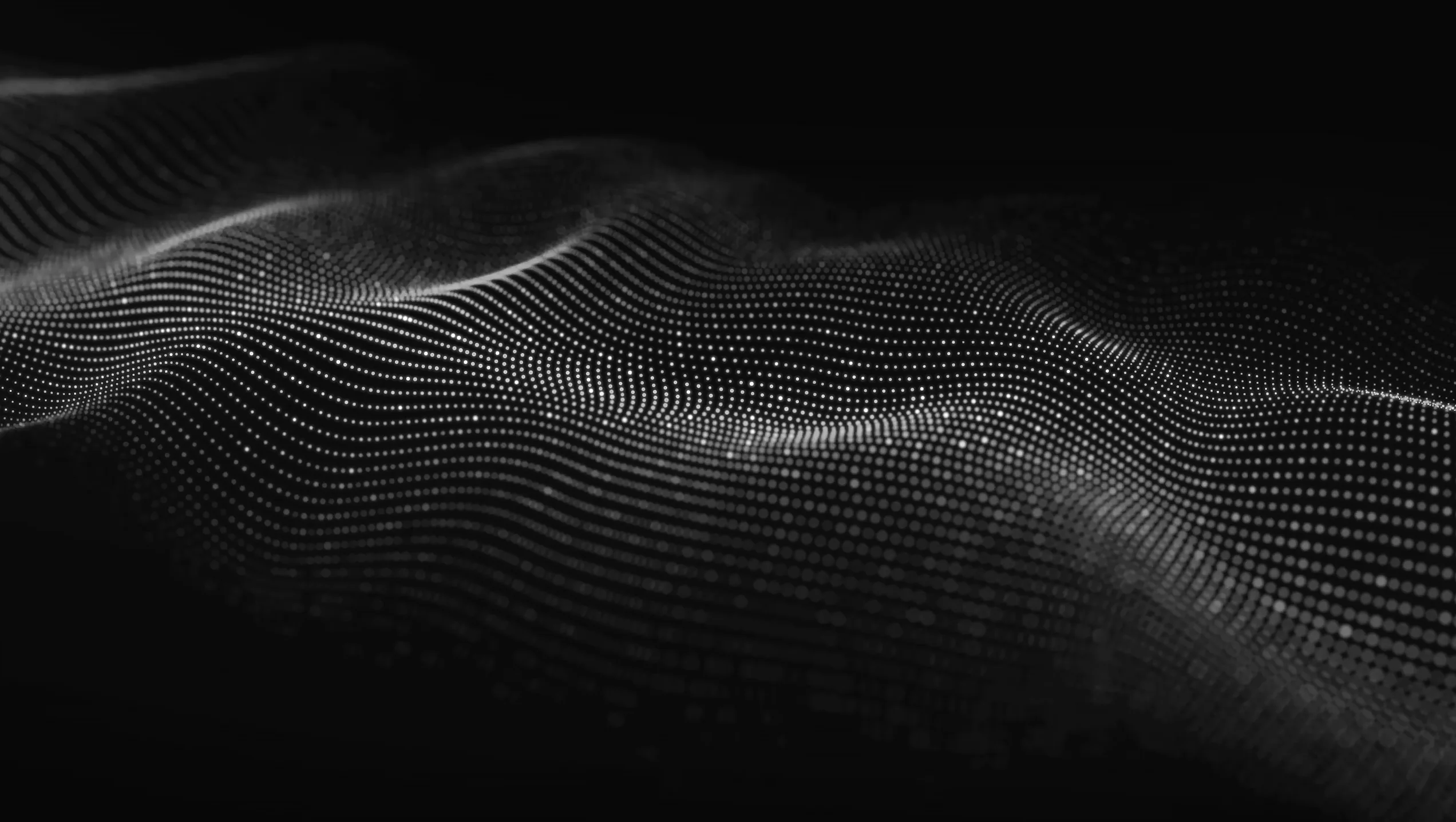Technologische Wellen Graue Punkte auf schwarzem Hintergrund formen ein Liniennetz.