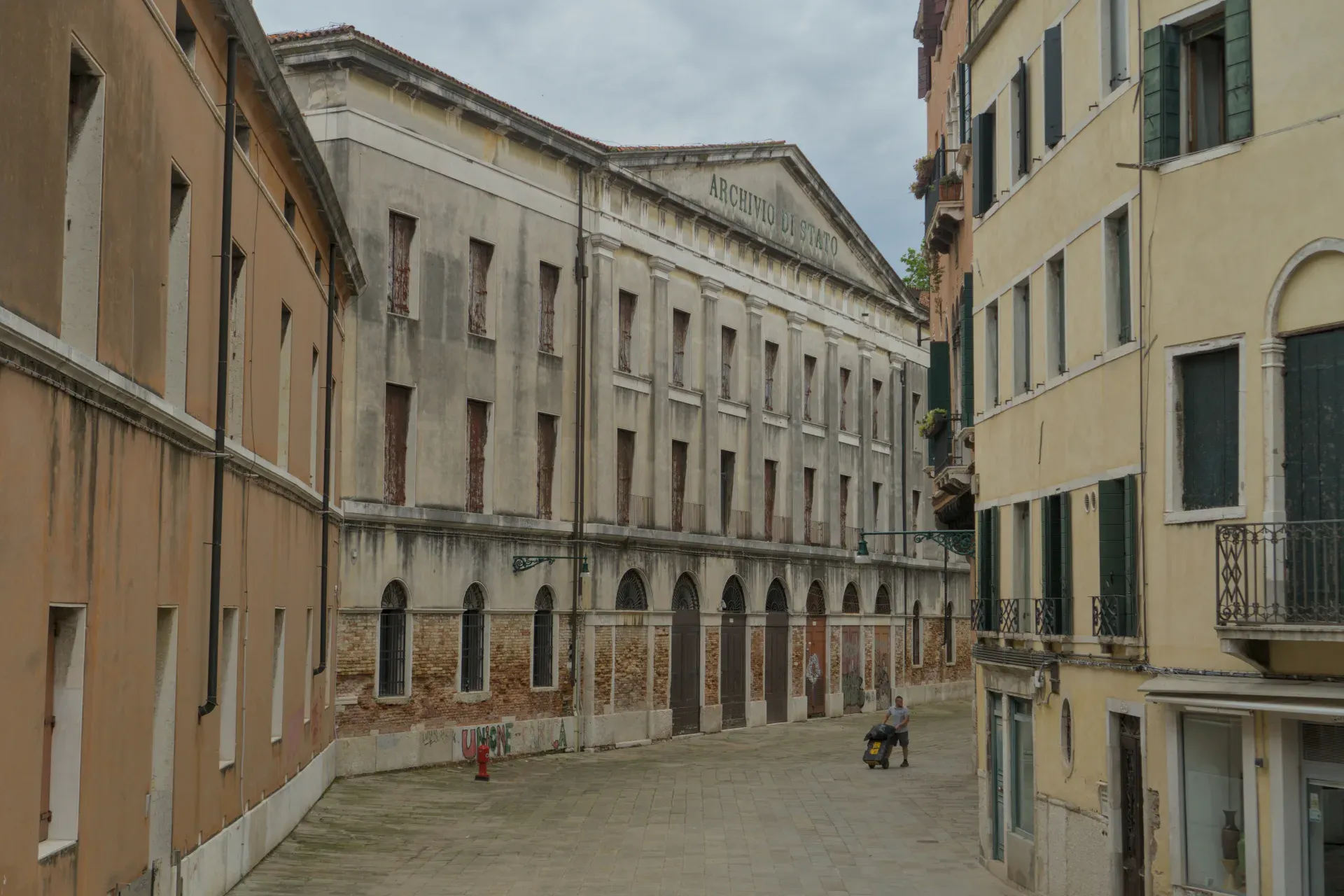 The State Archives in Venice with its classical facade and muted colors, a classic architectural subject.