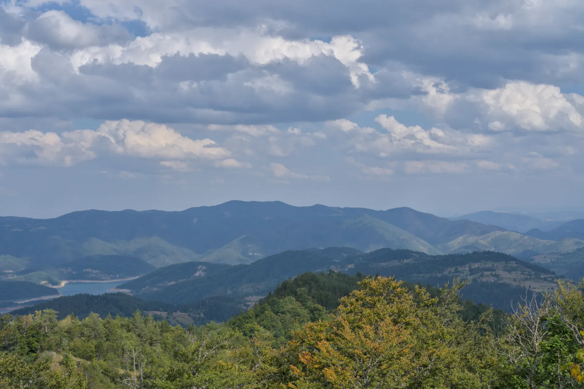 Scenic landscape view of Zaovine Lake and mountains, captured from Janjac peak in Tara National Park, Serbia.