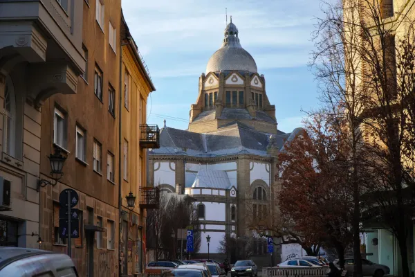 Novi Sad Synagogue, shot from Petra Drapšina Street, in golden sun rays.
