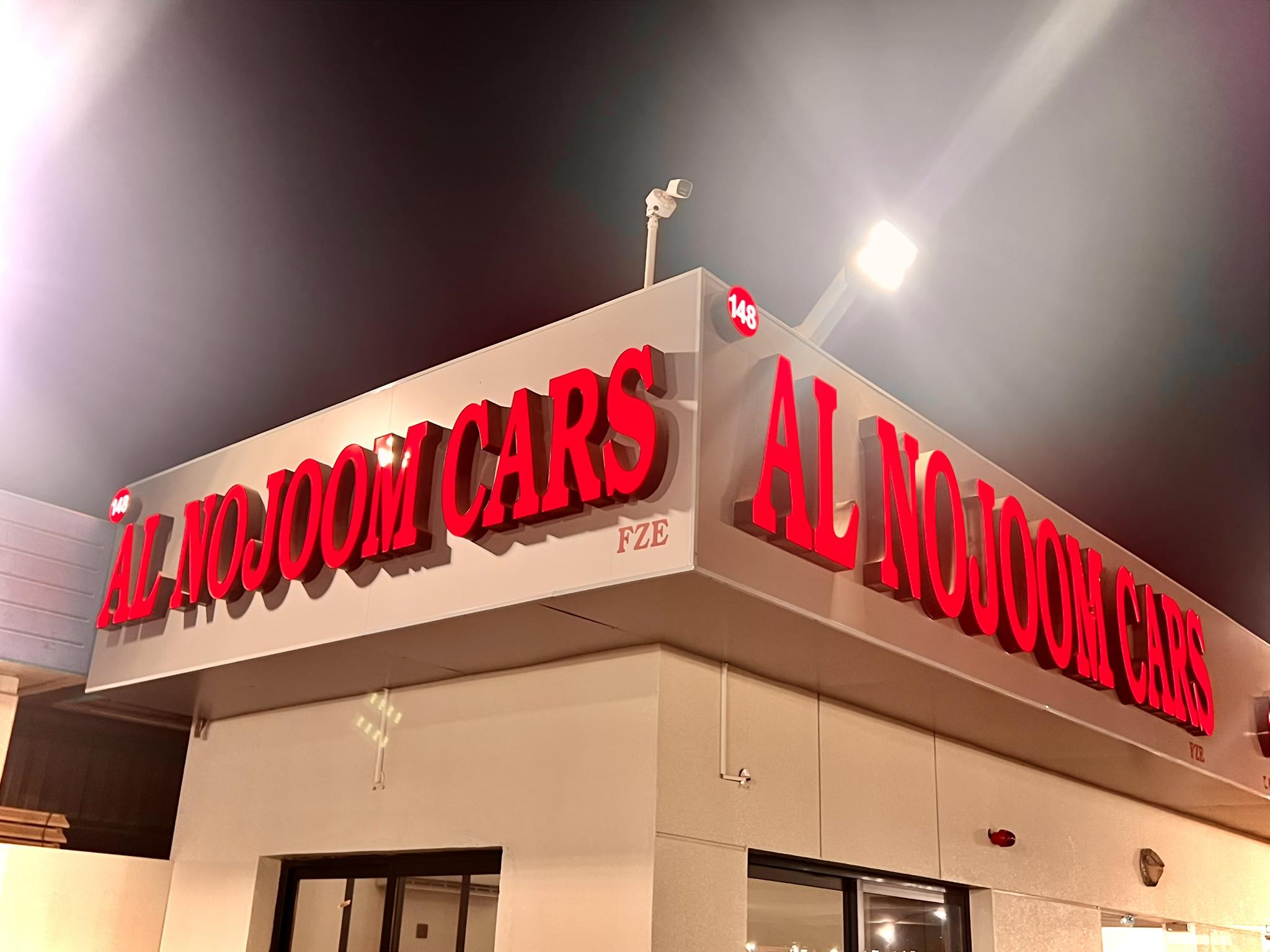 AL NOJOOM CARS FZE dealership logo