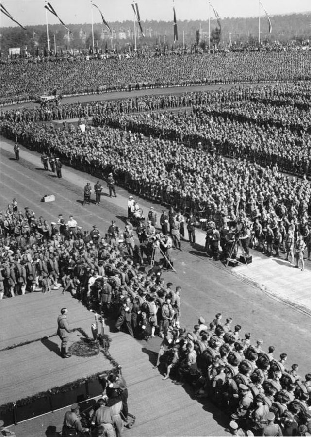 Hitler was the focal point at the 1934 Nuremberg Rally, with Leni Riefenstahl and her crew visible in front of the podium.