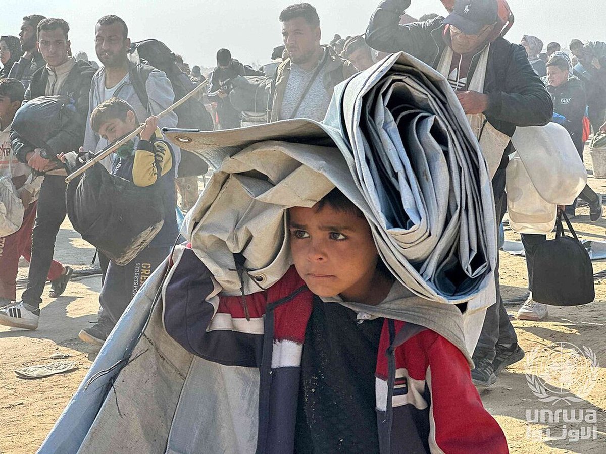 Return of displaced people via Al-Rasheed Street after the ceasefire, January 2025, Gaza Strip
