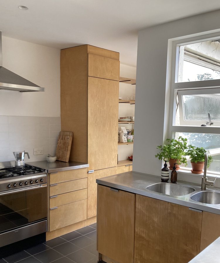 repurposed shipping container becomes 24-sqm birch plywood micro-cabin