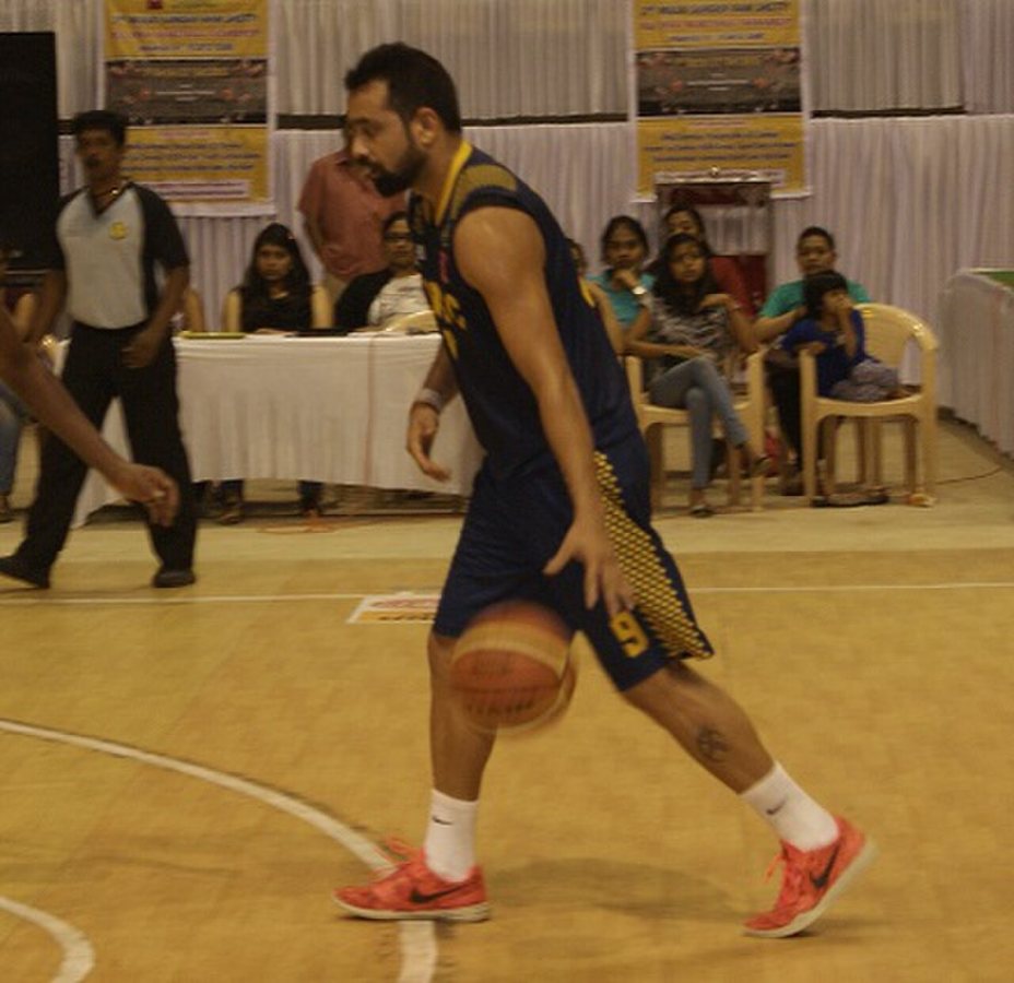 Bhriguvashi dribbling the ball down the court