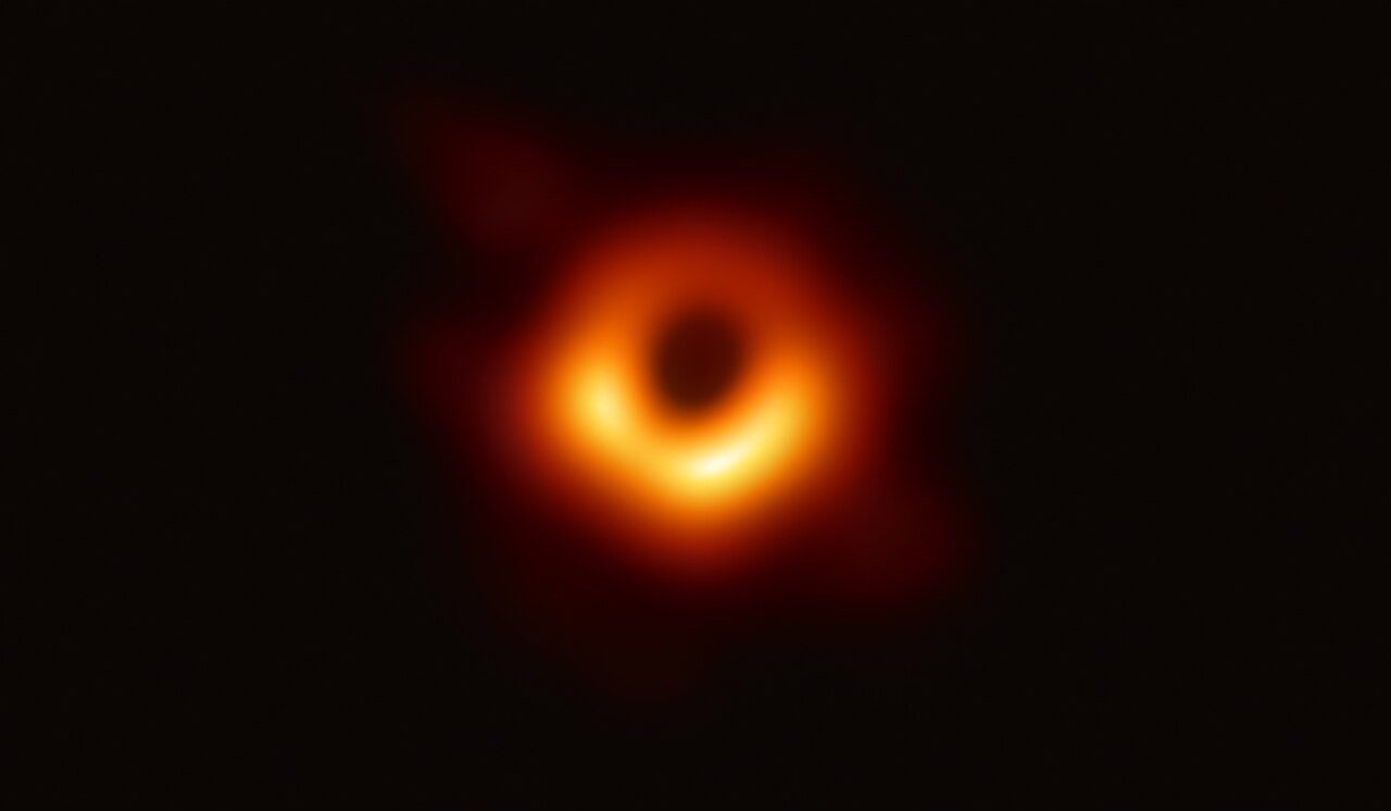 The first image of a black hole's event horizon, obtained by the Event Horizon Telescope in 2019, shows the asymmetric brightness of the accretion disk.