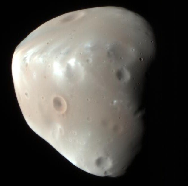 A giant crater may reveal the origin of Mars’ doomed moon