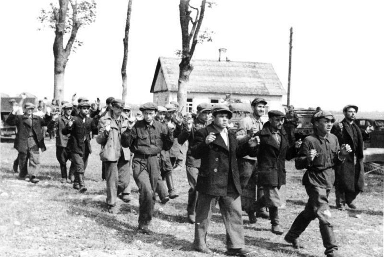 Original Nazi propaganda caption: "Too bad even for a bullet... The Jews shown here were shot at once." 28 June 1941, Rozhanka, Belarus