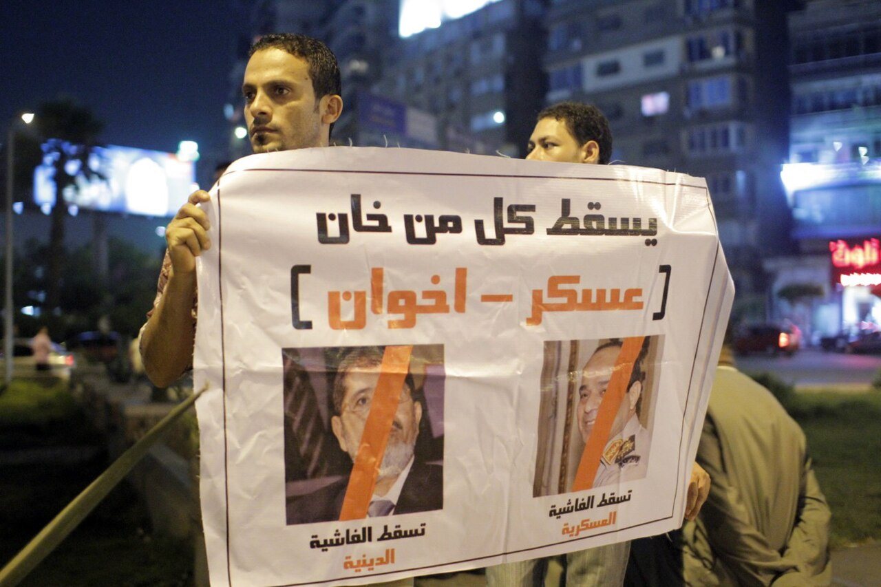 Manifestantes del movimiento Tercera Plaza, que no apoyaba ni al anterior gobierno de Morsi ni a las Fuerzas Armadas, 31 de julio de 2013