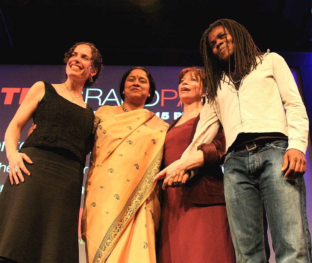 Allende (in red, third from left), at TED in California in 2007, flanked by June Cohen, Lakshmi Pratury and Tracy Chapman