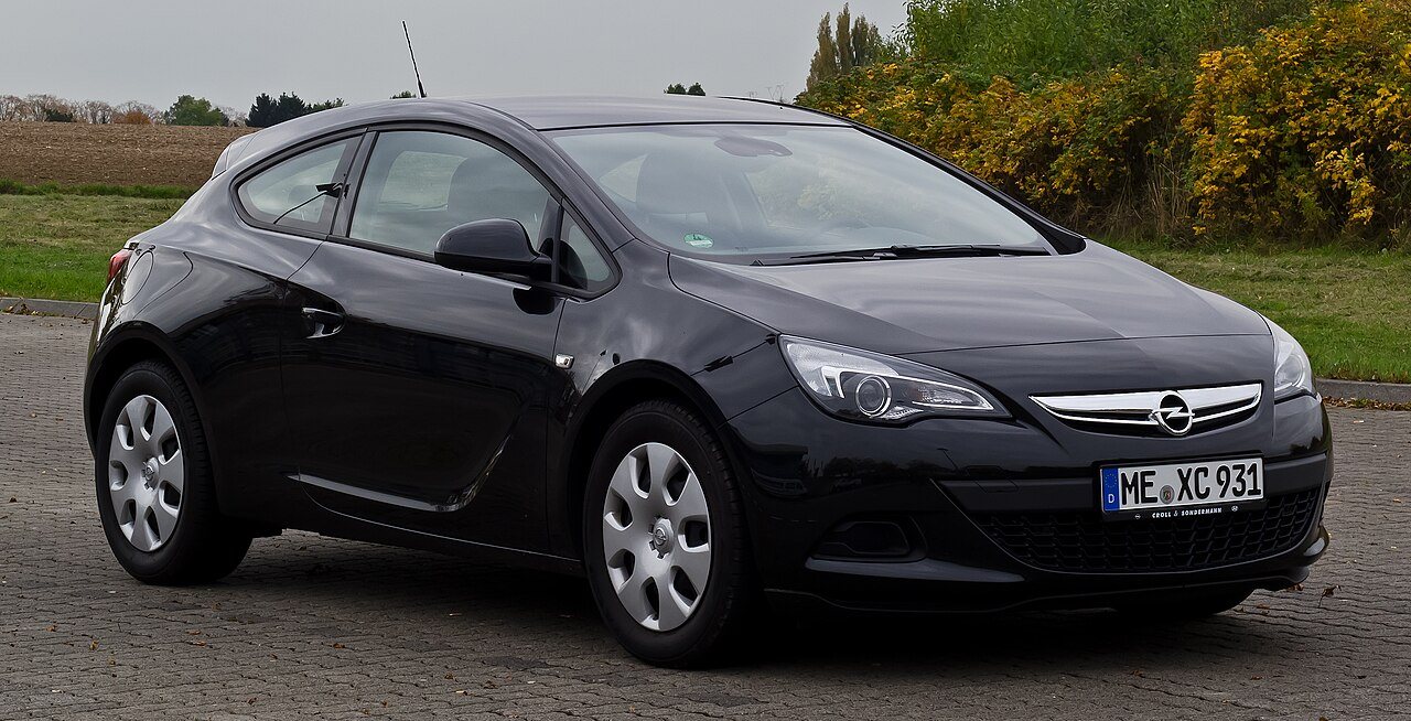 Opel Astra GTC 1.4 Turbo ecoFLEX Edition J, vista frontal, octubre de 2012, Heiligenhaus