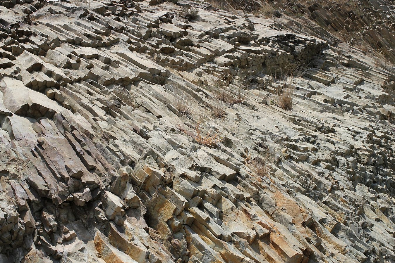vollebak turns thousands of tiny slate tiles into a flexible rock jacket