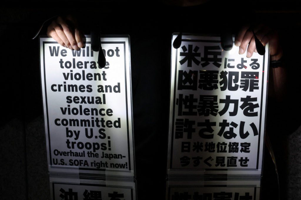 A U.S. Marine has been arrested in the killing of a woman on Okinawa, triggering outrage in Japan