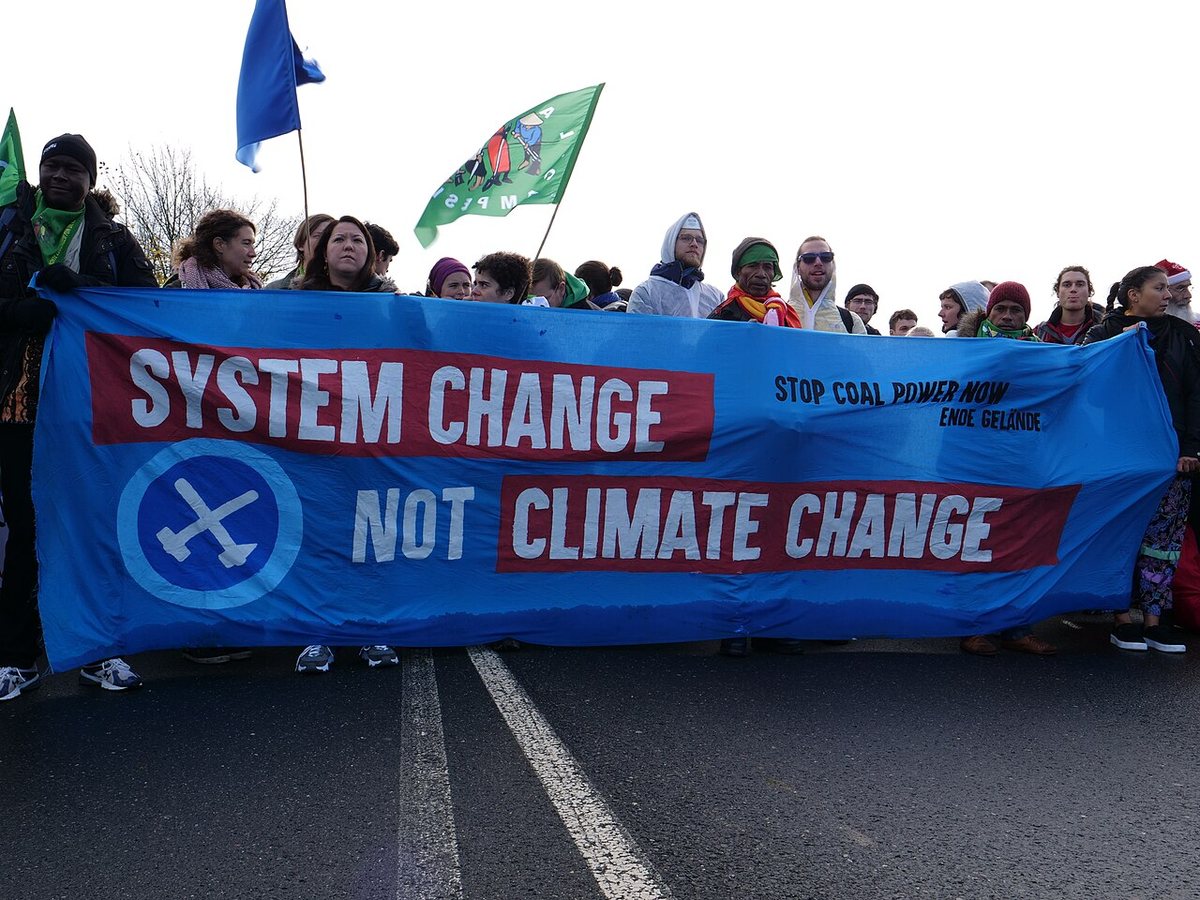 What Can Climate Change and Covid Teach Us About A.I. Doom?