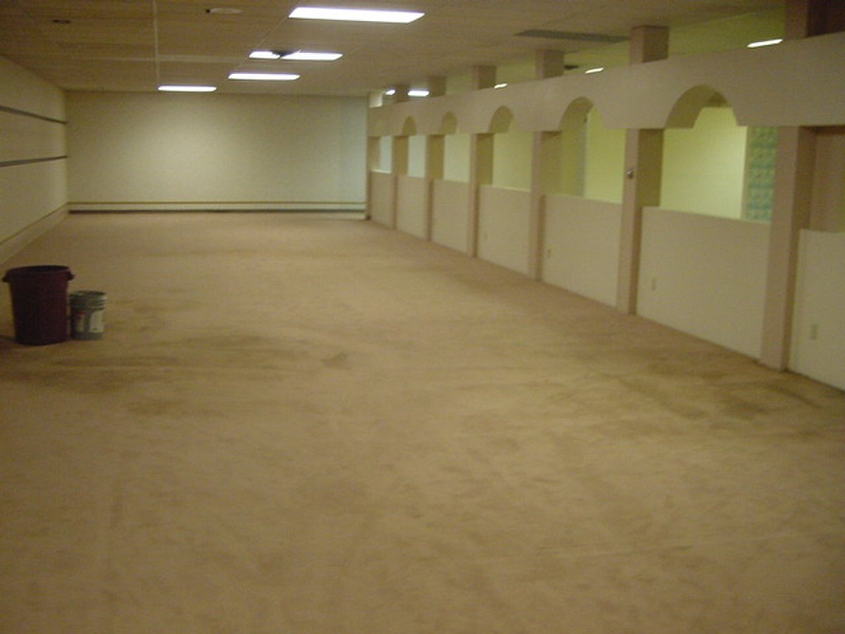 A photo of the same location as the original, taken on the same day during the renovation of a hobby shop.