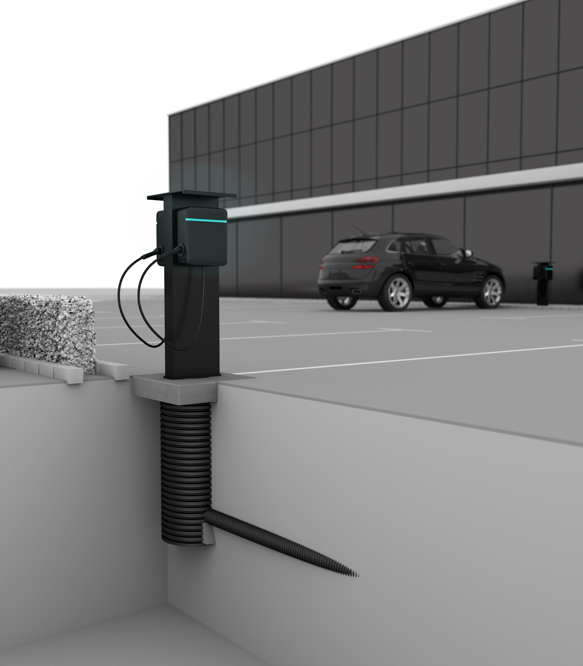 Einbaubeispiel Hauff Ladesäulenfundament ULF 380 mit montierter Ladesäule und angeschlossenem Leerrohr für Strom- und Datenkabel im Parkplatzbereich