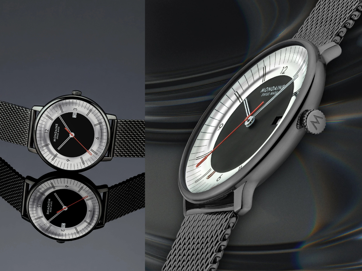 Mondaine-Armbanduhr mit schwarzem Gehäuse, schwarzem Milanaise-Armband, silbrig-weißem Zifferblatt, schwarzer Mitte und roten Sekundenzeiger