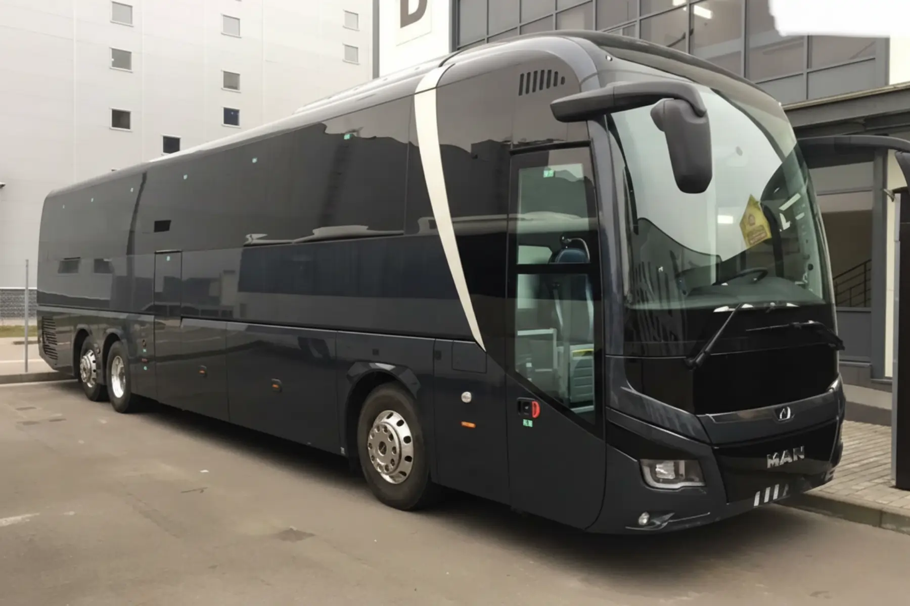 Luxury VIP coach rental – exterior view of VIP touring coach