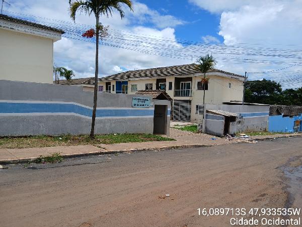Vende-se em Cidade Ocidental-GO  apto, 79.86 de área total, 52.59 de área privativa,  2_qto(s), varanda, a.serv, WC, 1_sala(s), cozinha, 1_vaga(s) de garagem.
