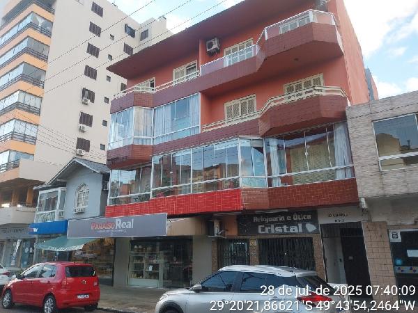 Vende-se em Torres-RS  apto, 82.80 de área total, 77.00 de área privativa,  2_qto(s), a.serv, WC, 1_sala(s), cozinha.