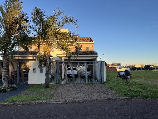Vende-se em Cascavel-PR  Casa, 224.27 de área total, 221.55 de área privativa, 280.00 de área do terreno,  3_qto(s), a.serv, WC, 1_sala(s), 1 lavabo(s), cozinha, 4_vaga(s) de garagem.