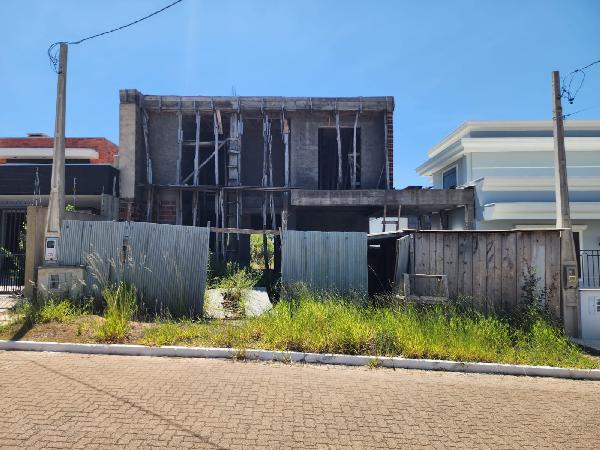 Vende-se em Gravatai-RS  Casa, 180.13 de área total, 180.13 de área privativa, 293.25 de área do terreno,  2_qto(s), a.serv, WC, WC Emp, 1_sala(s), 1 lavabo(s), cozinha.
