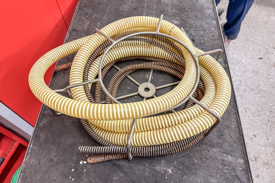 Reinigungspirale und Schlauch