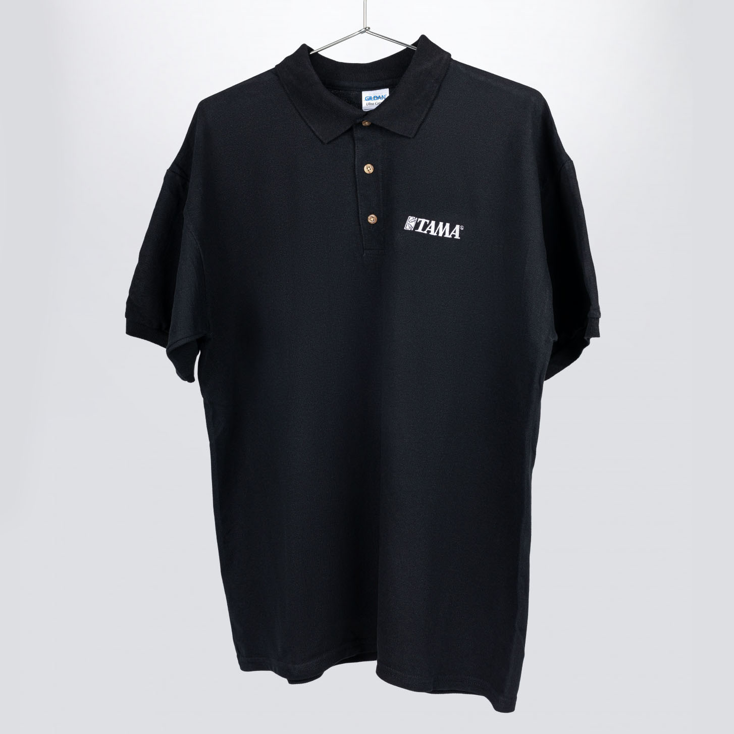 Tama polo in black with logo on left chest (TP14-S)
