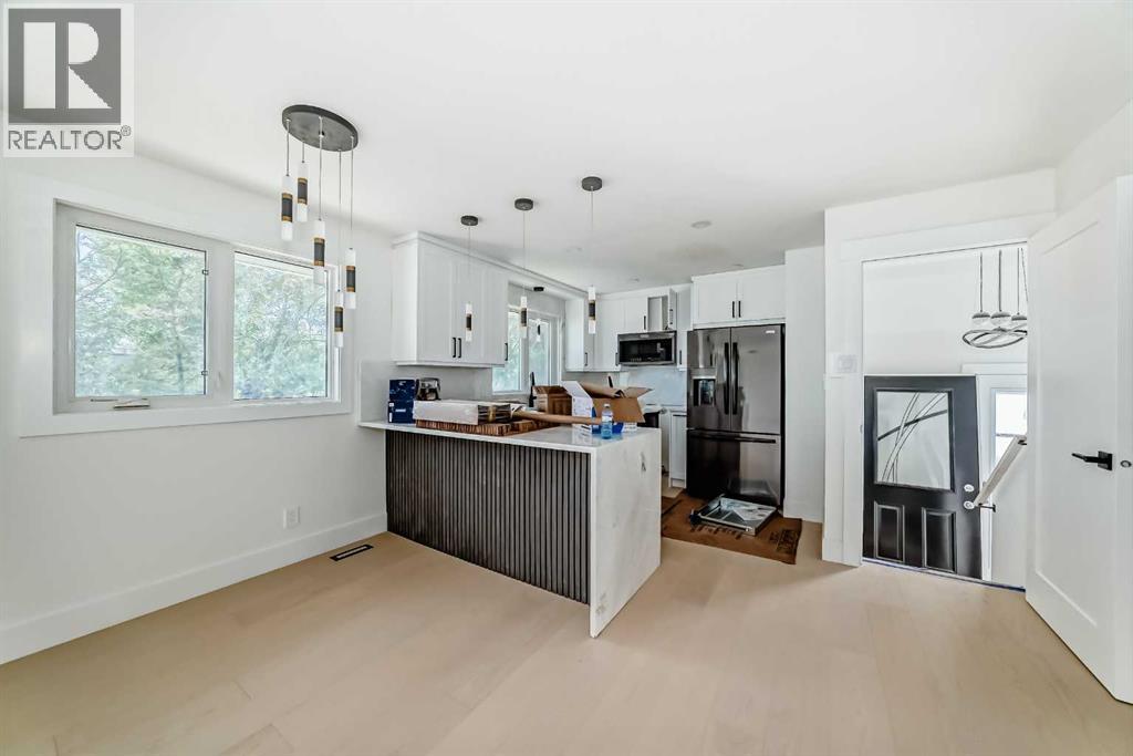 Property image for 6619 4 Street NW|Calgary, Alberta T2K1C1