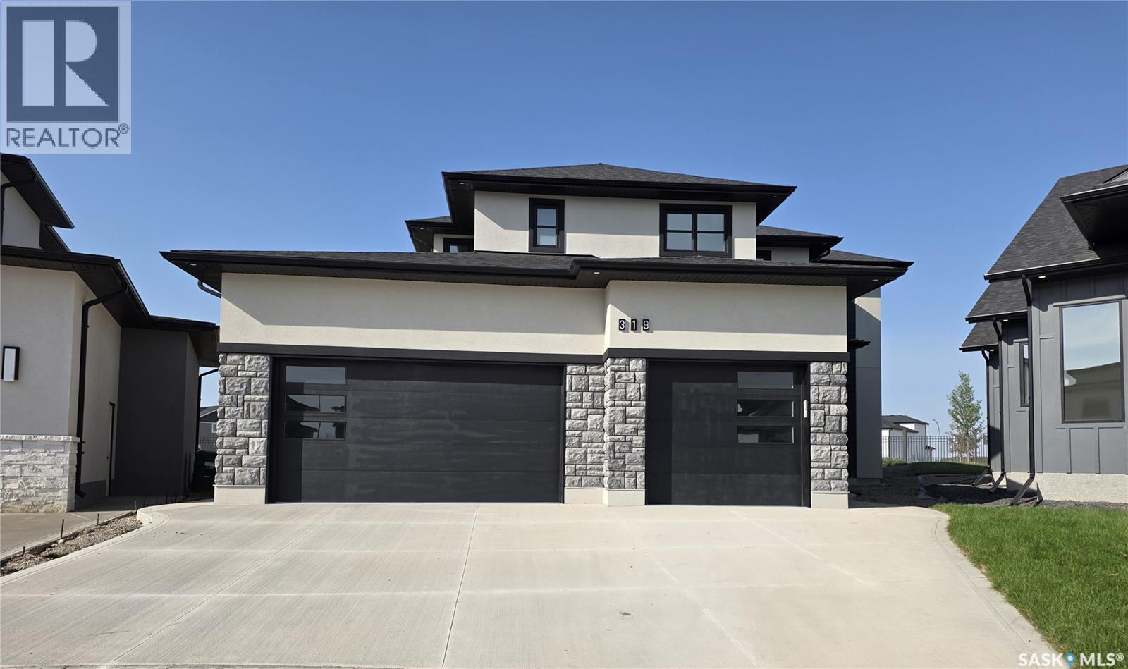 319 Woolf BAY|Saskatoon, Saskatchewan S7W1E5