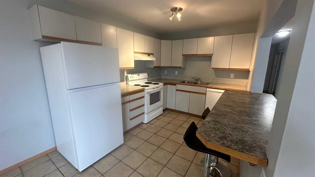 Primary image of 8-6203 Bowness Road NW, Calgary, AB, T3B0E2