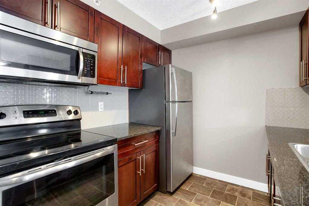 Additional image 3 of 9407-403 Mackenzie Way SW, Airdrie, AB, T4B 3V7