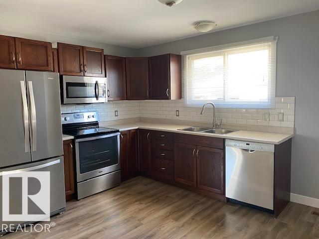 #Main 4907 32 AV NW