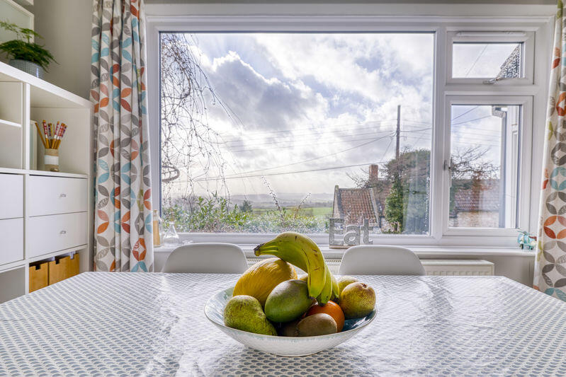 Elevated detached village home in West Horrington enjoying open views across Wells  photo 4